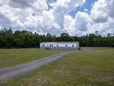 2362 NE County Road 1469 — exterior photo