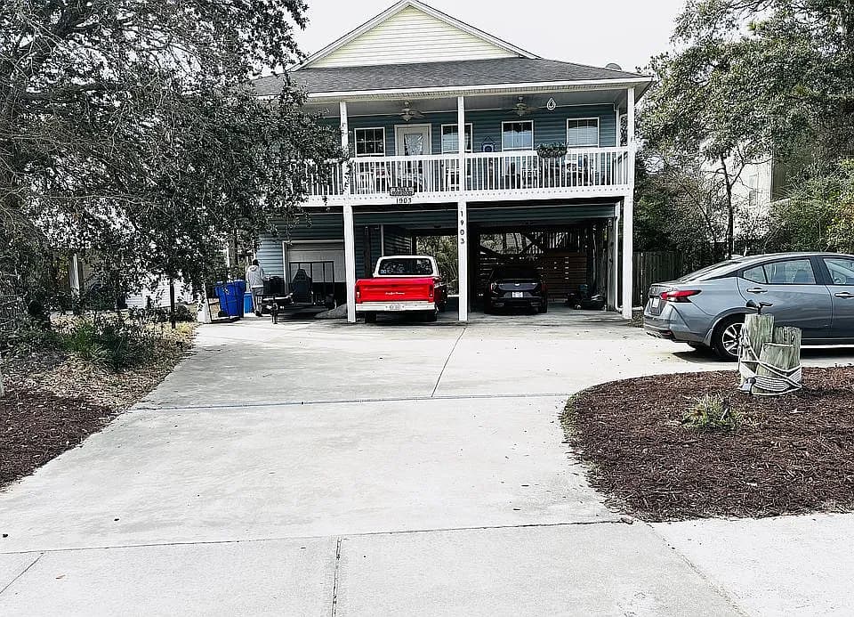 1903 E Oak Island Dr — exterior photo