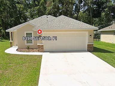 8394 SE 158th Pl — exterior photo