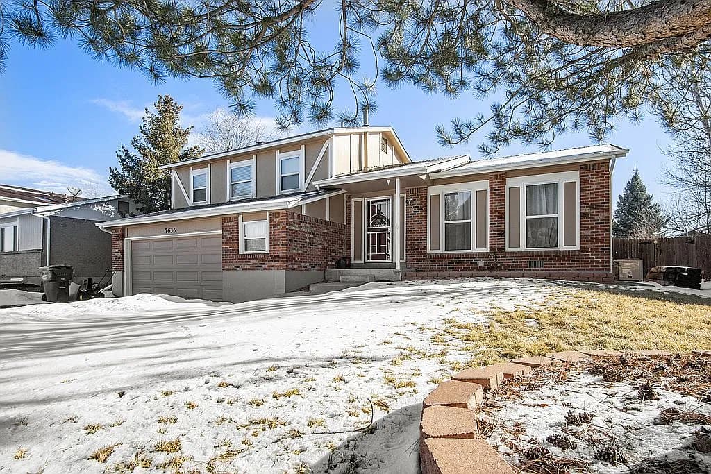 7636 S Garland St — exterior photo