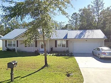 1301 Pelican Ln SE — exterior photo