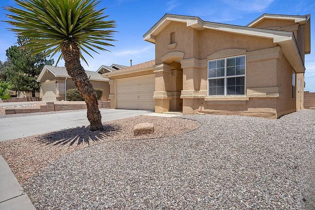 7705 Snowy Egret Ct NW — exterior photo