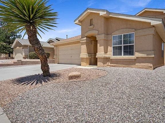 7705 Snowy Egret Ct NW — exterior photo